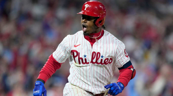 Phillies second baseman Jean Segura celebrates after hitting a go-ahead two-run single against the Padres in Game 3 of the NLCS.